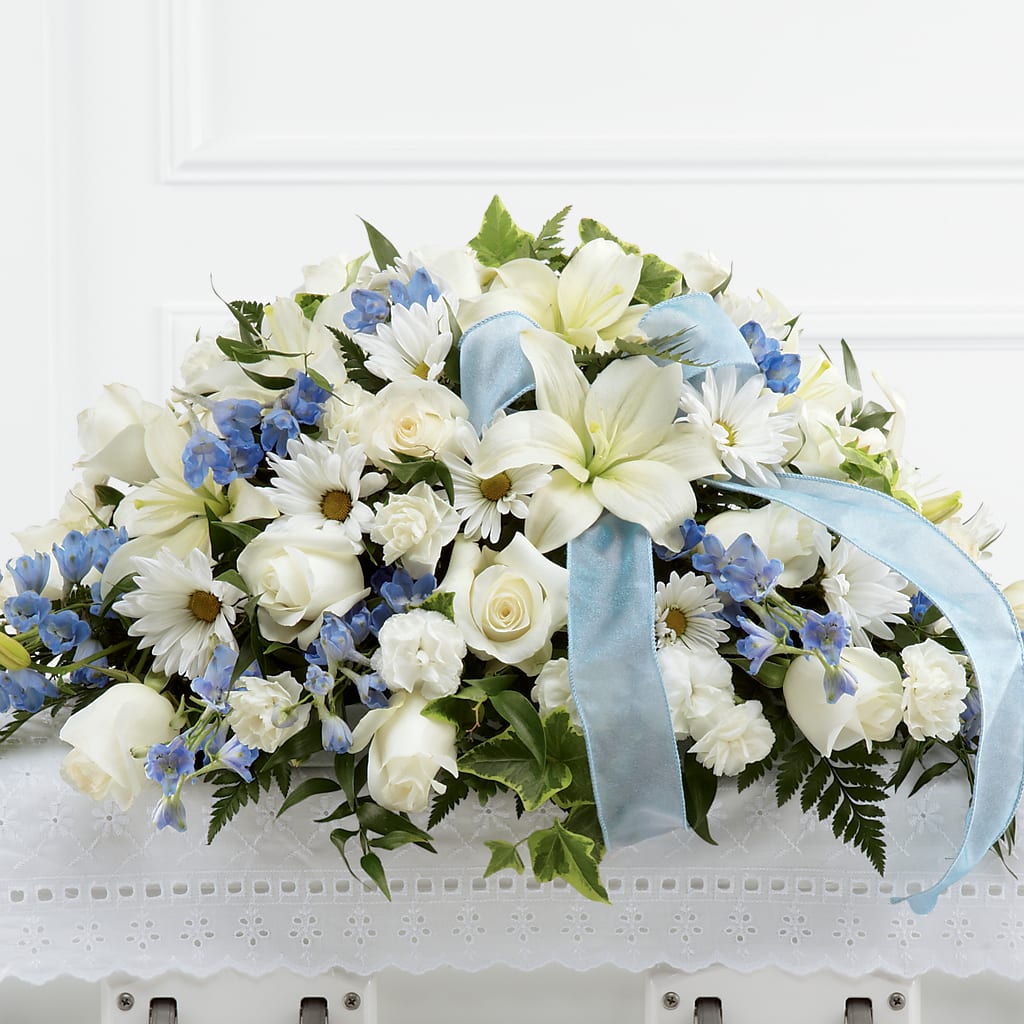 Tender Treasure Casket Spray – Forget Me Not Flowers, Whitney TX